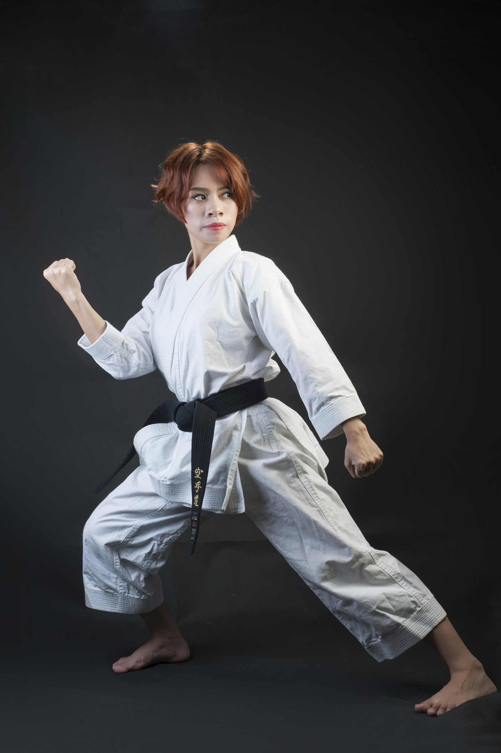 Adult student in martial arts gi